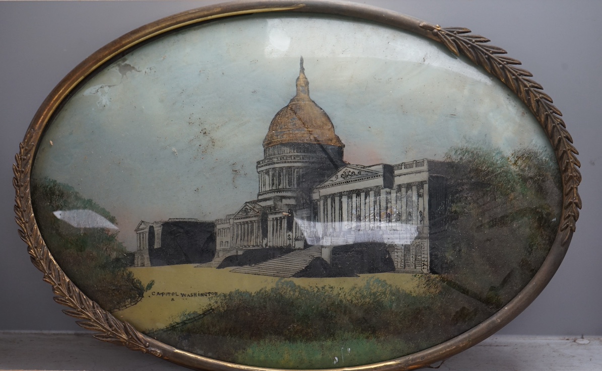 20th century School, reverse glass painted convex oval panel, ‘Capital Washington’, 34 x 48cm. Condition - poor